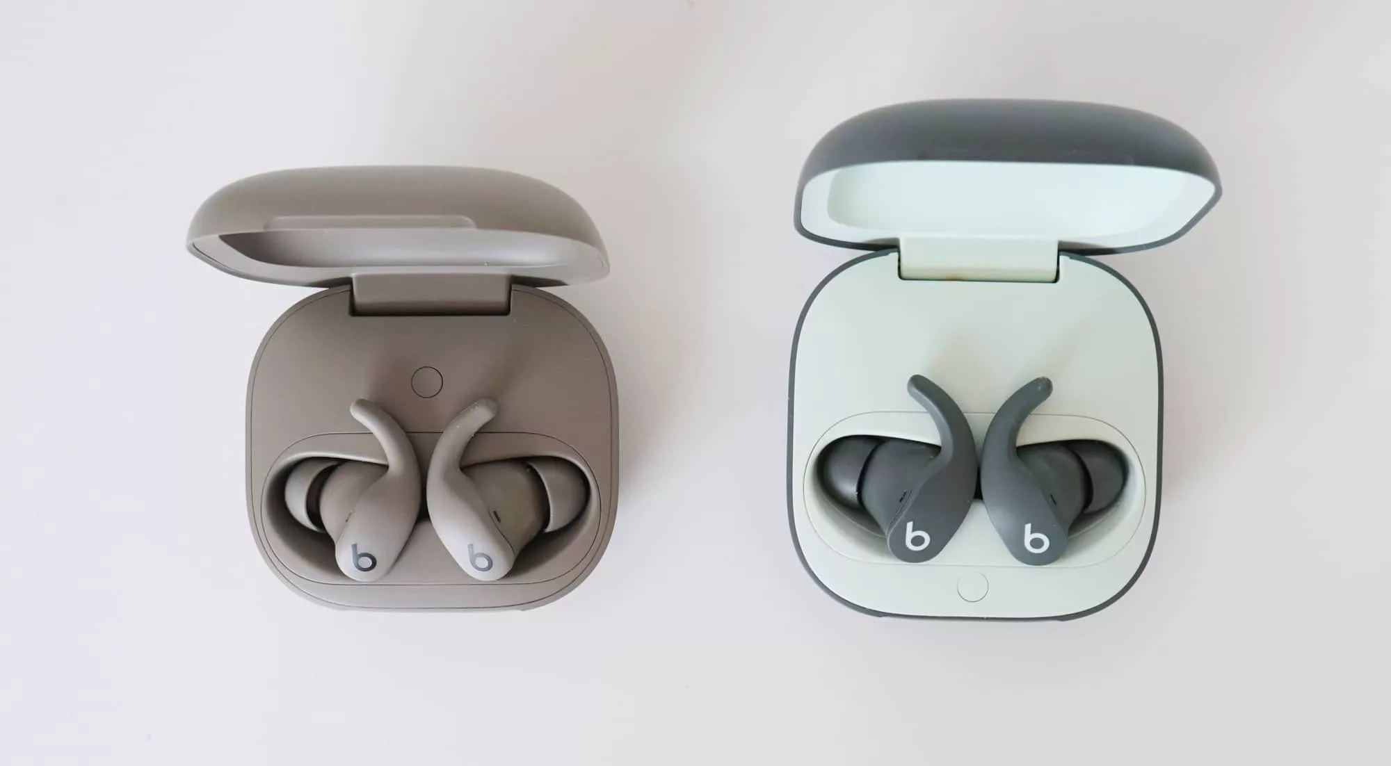 There's not a lot of difference between the Beats Powerbeats Fit (left) and the Beats Fit Pro (right).